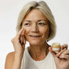 product image-8,Customer applying the Eye Cream