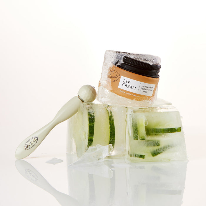 small product image-3,UpCircle Merry + Bright Eyes Gift Set: UpCircle Eye Cream and Eye Roller Massage Tool together in a lifestyle setting